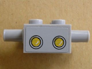 LEGO 30000pb01 Brick, Modified 2 x 2 with Pins and Axle Hole and Headlights Pattern (Sticker) - Set 3831 - Main Product Image