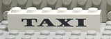 LEGO 3009pb002 Brick 1 x 6 with Black 'TAXI' Thick Pattern - Main Product Image