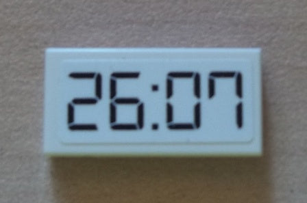 LEGO 3069pb0169 Tile 1 x 2 with Black &#39;26:07&#39; Digital Clock Pattern (Sticker) - Set 8423 - Main Product Image
