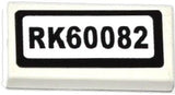 LEGO 3069pb0365 Tile 1 x 2 with &#39;RK60082&#39; Pattern (Sticker) - Set 60082 - Main Product Image