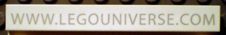 LEGO 4162pb038 Tile 1 x 8 with 'WWW.LEGOUNIVERSE.COM' Pattern thin font - Main Product Image