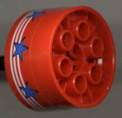 LEGO 4266pb01 Wheel 20 x 30 Technic with 3 White Stripes and 7 Blue Stars Pattern (Sticker) - Set 6615 - Main Product Image