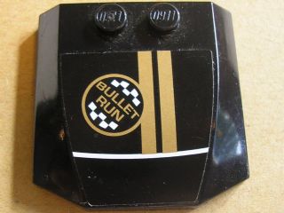 LEGO 45677pb032 Wedge 4 x 4 x 2/3 Triple Curved with 'BULLET RUN' and Two Gold Stripes Pattern (Sticker) - Set 8147 - Main Product Image
