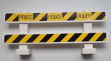 LEGO 6079pb06 Fence 1 x 8 x 2 2/3 with Black 'POLICE' on Black and Yellow Danger Stripes Pattern (Stickers) - Set 60007 - Main Product Image