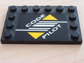 LEGO 6180pb004 Tile, Modified 4 x 6 with Studs on Edges with Code Pilot Pattern (Sticker) - Set 8479 - Main Product Image