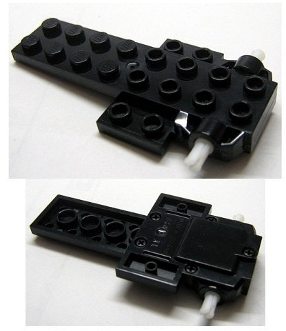 Top and bottom views of a black LEGO 8x4x2/3 pullback motor with white axles extending from each end.