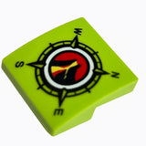 Lime green LEGO curved 2x2 slope with a compass design featuring N, E, S, W, and a red, yellow, black Volcano Explorers logo.