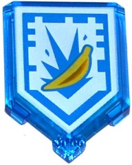 A transparent blue LEGO 2x3 pentagonal tile with a white shield pattern featuring a yellow banana and blue explosion lines, representing Nexo Power Banana Bombs.