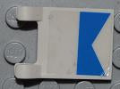 White LEGO 2x2 flag piece with a blue diver pattern, displayed on a gray LEGO baseplate.