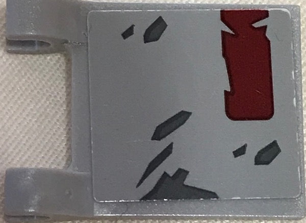 Gray LEGO 2x2 flag piece with a sticker showing dark red and dark gray distressed markings.