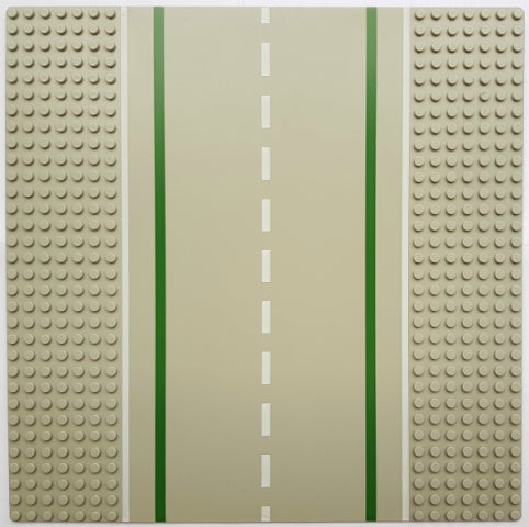 LEGO 32x32 straight road baseplate with green lines, white dashed center, and studded light tan shoulders.