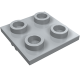 Light gray LEGO 2415 Modified 2x2 Thin Plate with four studs, angled view.