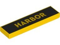 LEGO Tile 1 x 4, yellow, with 'HARBOR' printed in gold on a black background.