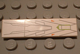 LEGO 2431px12 white 1x4 tile with gray lines, orange triangles, and a lime green cockpit outline, on a gray baseplate.