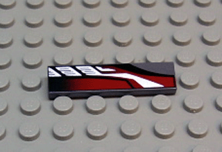 LEGO 2431px19 dark gray 1x4 tile with a sleek silver, red, and black pattern, resting on a gray baseplate.