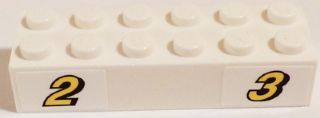 White LEGO Brick 2 x 6 with Yellow Number 2 and 3 with Black Outline Pattern.