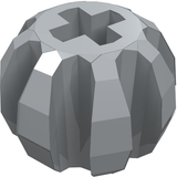 Grey LEGO Technic Ball with Grooves (Part 2907) with a cross axle hole. The part has a faceted, spherical design.
