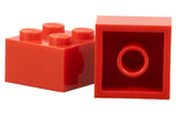 Two red LEGO 3003old 2x2 bricks. One shows studs, the other its hollow bottom with a central tube.