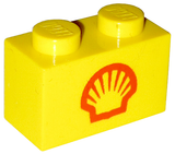 Yellow LEGO 1x2 brick with a red Shell logo on its side.