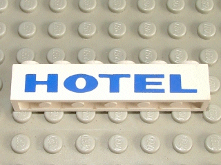 White LEGO 1x6 brick with blue 'HOTEL' thick pattern, resting on a grey LEGO baseplate.