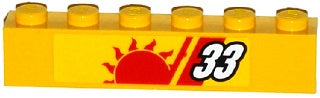 Yellow LEGO 1x6 brick with red sun, red stripes, and white number 33 with black outline on the side.