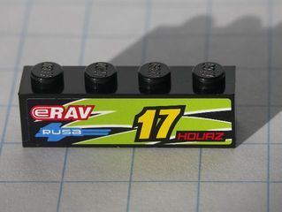 Black LEGO 1x4 brick with a sticker featuring a lime green flame pattern, yellow '17', red 'HOURZ', 'eRAV', and 'RUSA' logos.