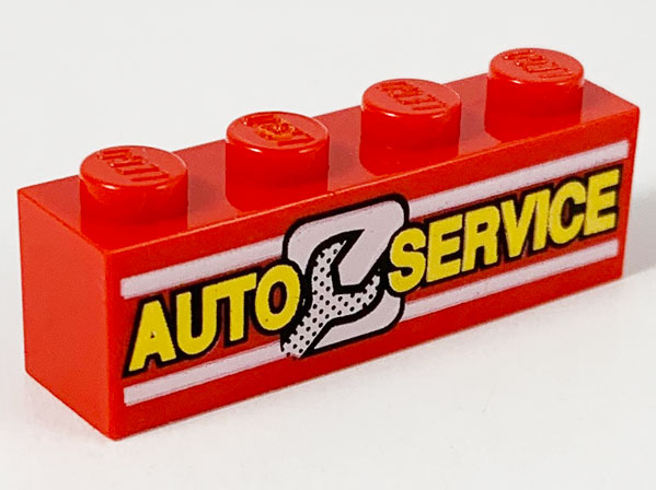 Red LEGO 1x4 brick with yellow 'AUTO SERVICE' text, white lines, and a stylized wrench pattern.