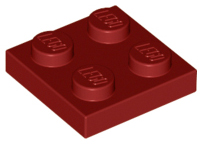 Close-up of a dark red LEGO 3022 Plate 2x2, showing the four studs on its surface, each embossed with 'LEGO'.