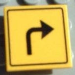 LEGO 30258pb005 yellow 2x2 square road sign tile with a black right turn arrow pattern.