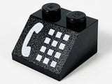 Black LEGO 45 2x2 slope brick with white phone receiver and button pattern print, two studs on top.