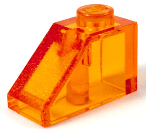 Transparent orange LEGO 3040 Slope 45 2 x 1 brick, angled from left to right.