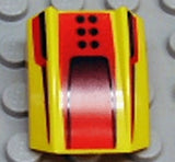 Yellow LEGO Slope, Curved 2 x 2 Lip with a red background pattern featuring black dots and a scoop design.