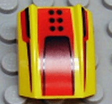 Yellow LEGO Slope, Curved 2 x 2 Lip with a red background pattern featuring black dots and a scoop design.