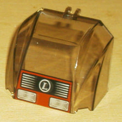Trans-brown LEGO 30633pb05 windscreen 4x6x4 canopy with hinge, featuring headlights, grille, and 'L' circle pattern.