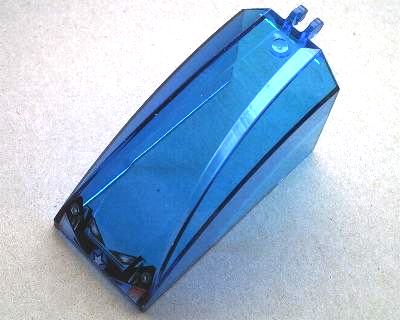 Trans-blue LEGO Windscreen 8x4x4 Curved with 2 Fingers, printed with headlights and star pattern.