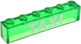 LEGO 3067pb07 trans-green 1x6 brick with white 'TAXI' pattern.
