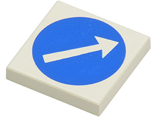 Light tan LEGO 2x2 tile with a blue circle pattern featuring a white arrow pointing diagonally right.