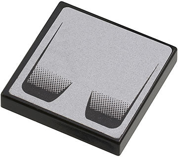 Black LEGO 2x2 tile 3068pb0374 with double air vent pattern on a silver background, as seen in set 8647.