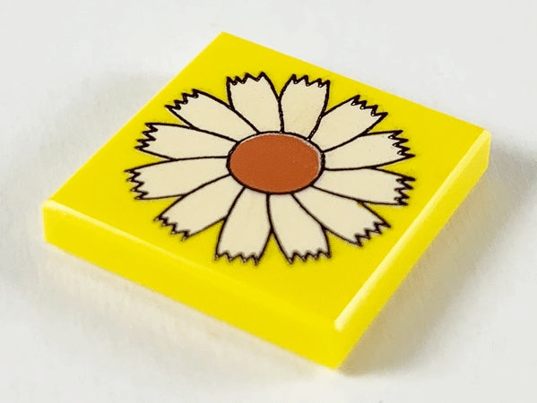 Yellow LEGO 2x2 tile with a white daisy flower pattern, featuring a brown center and black outline.