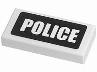White LEGO 1x2 tile with 'POLICE' written in white text on a black background pattern.