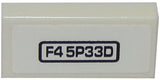 White LEGO Tile 1 x 2 (3069pb0378) with 'F4 5P33D' pattern inside a black bordered rectangle.