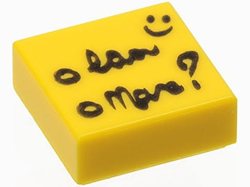 Yellow LEGO 1x1 tile with black script, question mark, and a smiley face pattern on top.