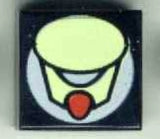 Black LEGO 1x1 tile with a light lime oval pattern featuring a red teardrop shape on a white circular background.