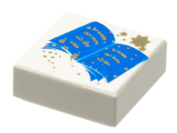 White LEGO 1x1 tile with a blue open book and gold stars pattern.