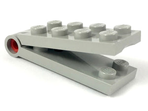 A light gray LEGO Hinge Plate 2 x 4 (part 3149c01) with a red pin, shown partially open on a white background.