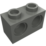Dark grey LEGO Technic Brick 1x2 with two studs on top and two holes on its side, viewed from an angle.