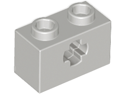A light bluish gray LEGO Technic brick, 1x2 studs, with two studs on top and an axle hole on the side.