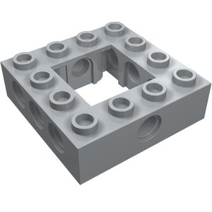 A light grey LEGO Technic Brick 4x4 Open Center, showing studs on top and pin holes on all four sides.