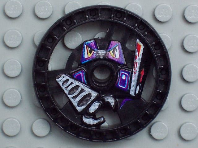 Black LEGO Technic Disk 5x5, RoboRider Talisman Wheel, featuring a detailed purple and white robot pattern.