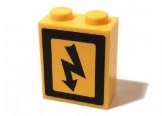 Yellow LEGO 1x2x2 brick with inside axle holder, featuring a black electricity danger sign sticker.